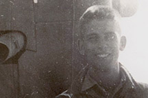 Bus Crumpton standing next to his plane, the Loose Goose.